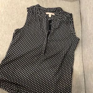 Black and white polka dot polyester top